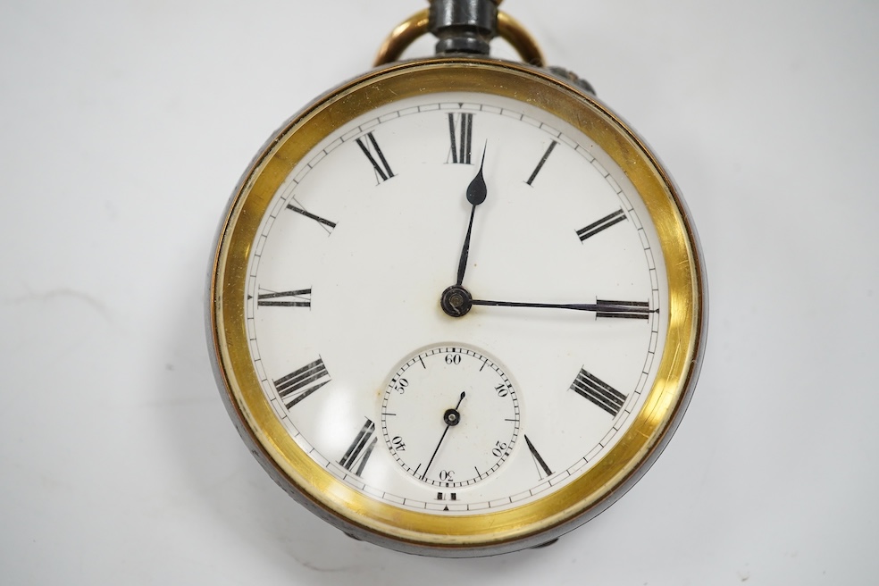 An Edwardian silver mounted leather travelling watch case, Birmingham, 1904, 95mm, with a gun metal cased pocket watch. Condition - poor